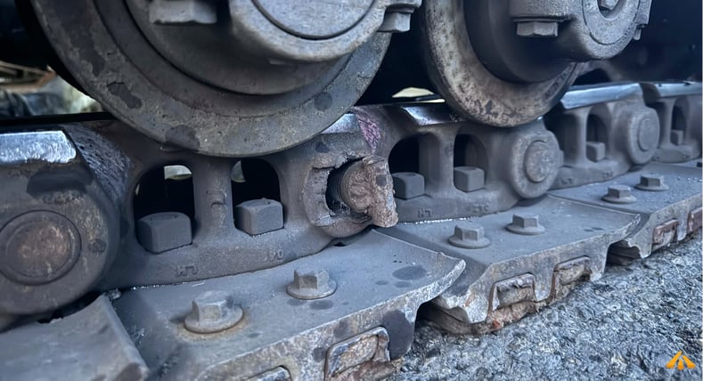 Track chain pin hole breakage at the real road construction site